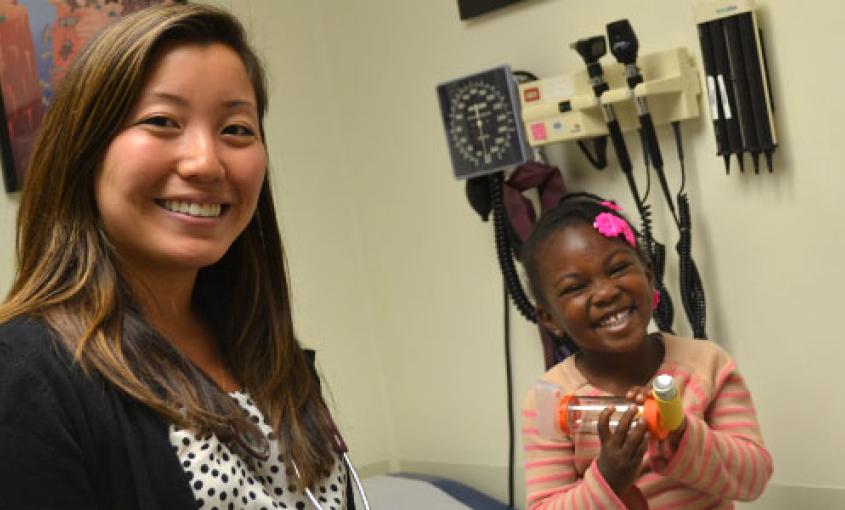 Kimberlee Honda (left), director of San Francisco General Hospital’s Pediatric Asthma Clinic, with a patient.