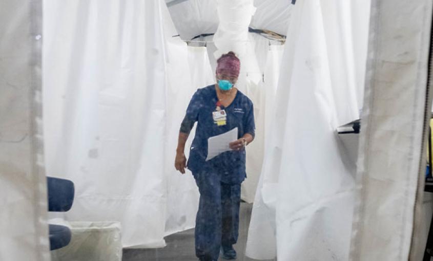 Nurse walks through hospital