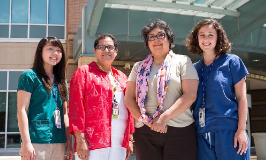 At the VA Palo Alto Health Care System, from left: Julie Tea, MEPN student; Gloria Martinez, associate director for Patient Care and Nursing Services; Denise Renfro; and Sophia Nogue, MEPN student (photo by Elisabeth Fall)