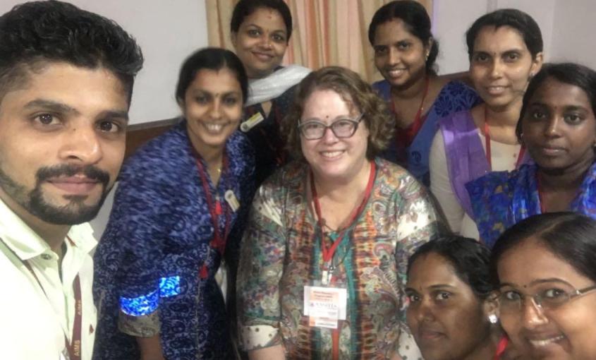 Sandra Staveski, PhD, CPNP-AC, FAAN, associate professor, (center) pictured with nurses from Amrita Hospitals in Kochi, India as they implement the Children’s HeartLink Nurse Residency Program in 2018 as an in-person program.