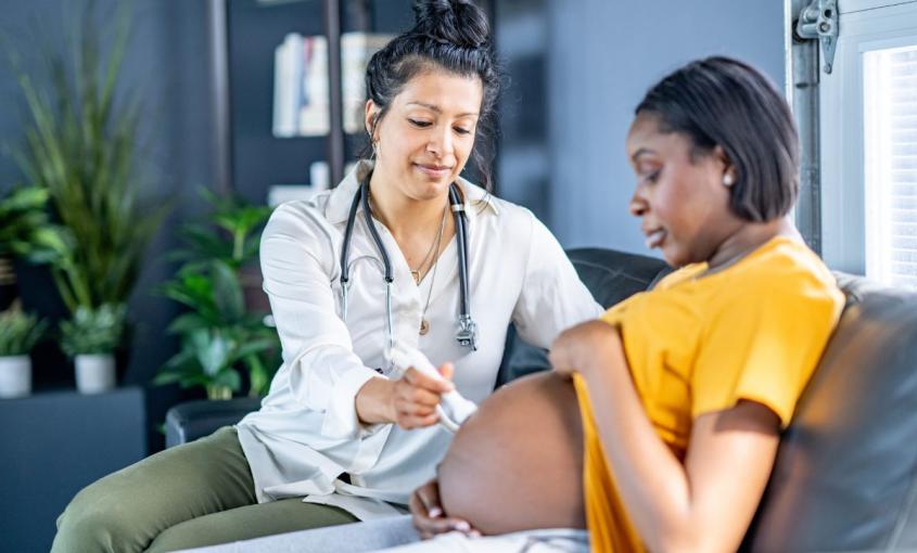 Nurse provides care to patient in their home