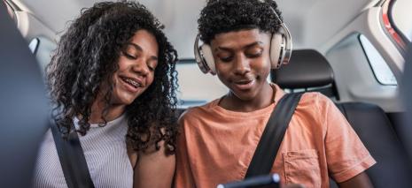 Two teenagers in a car