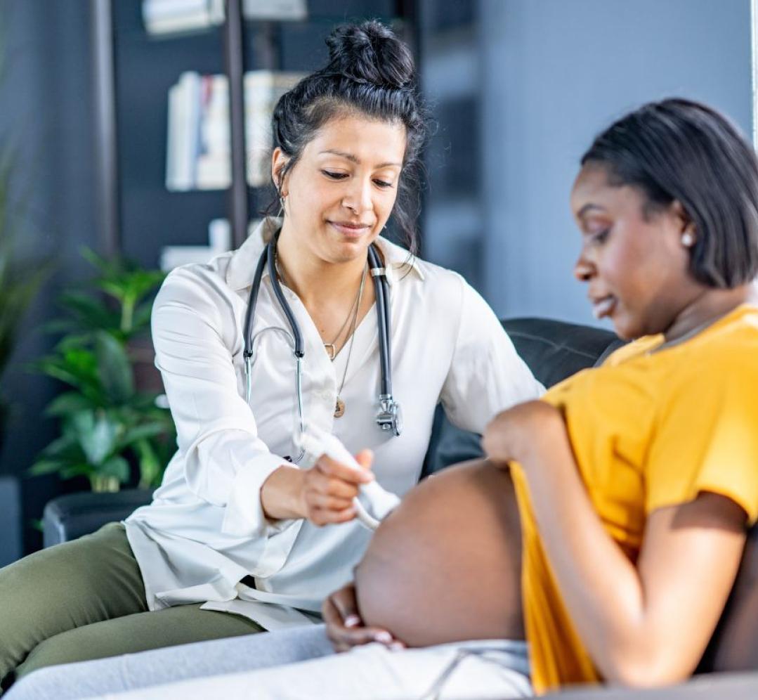 Nurse provides care to patient in their home